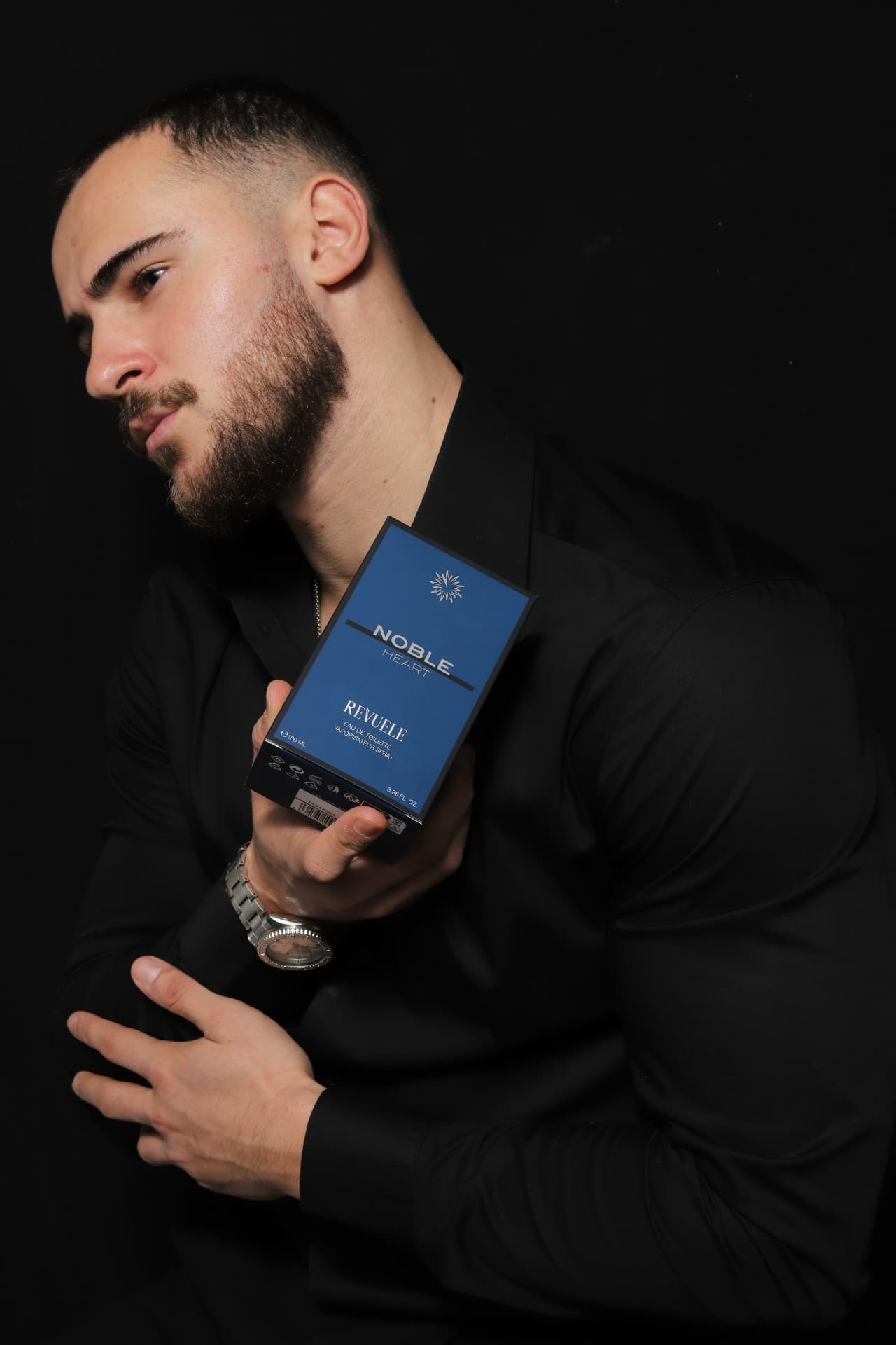 EAU DE TOILETTE MEN REVUELE Noble Heart Eau de Toilette — packshot in use