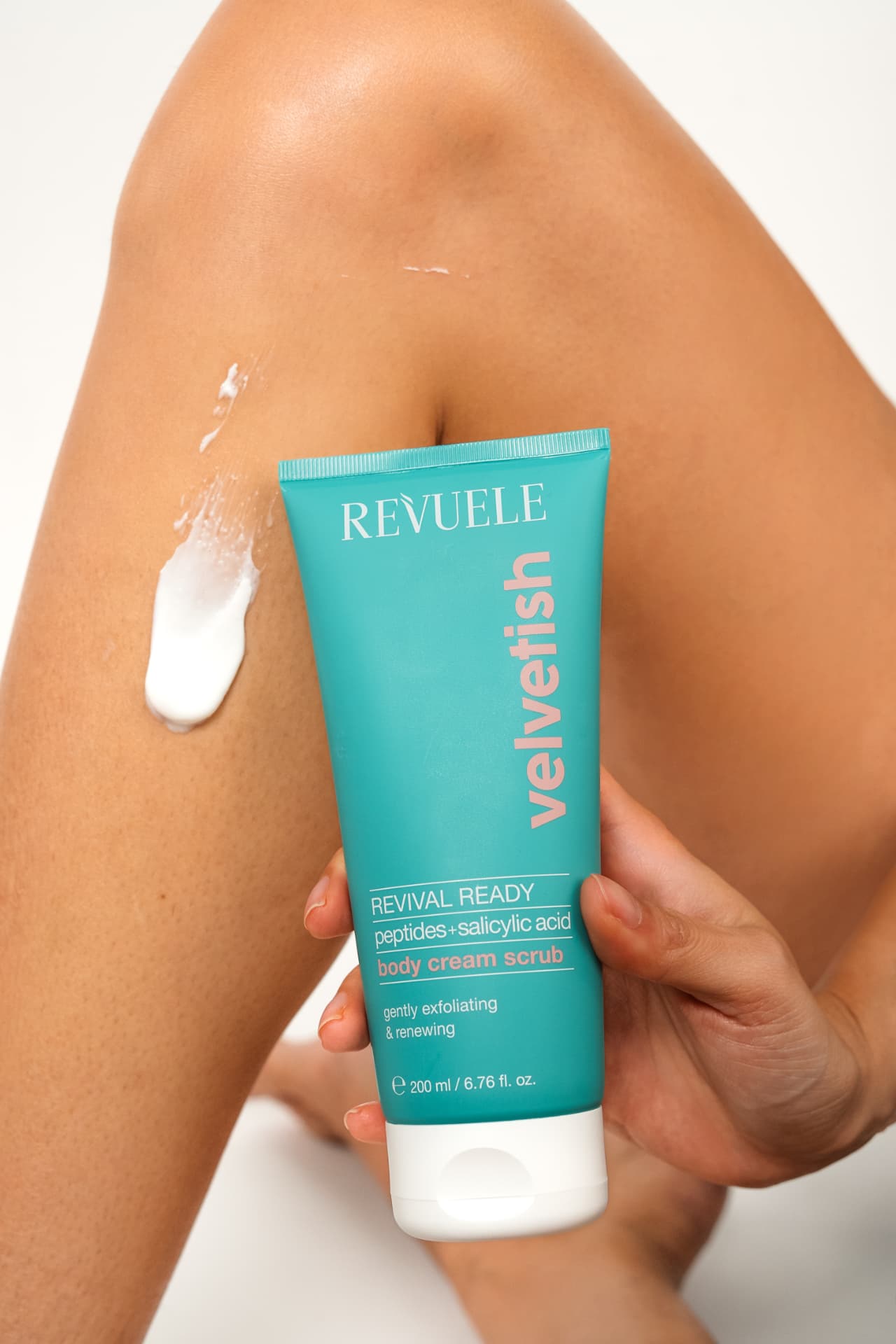 VELVETISH CREAM SCRUBS REVIVAL READY Peptides + Salicylic Acid — packshot in use