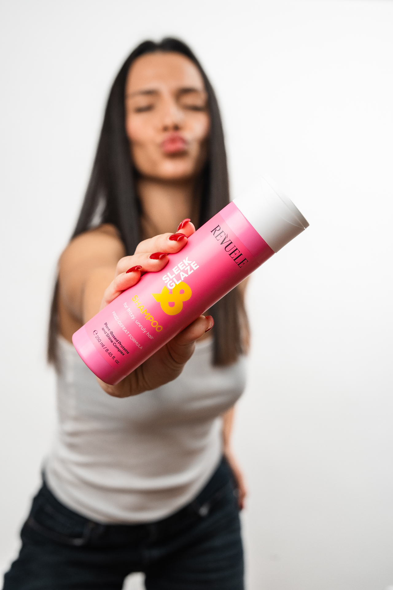 SLEEK & GLAZE Shampoo — packshot in use