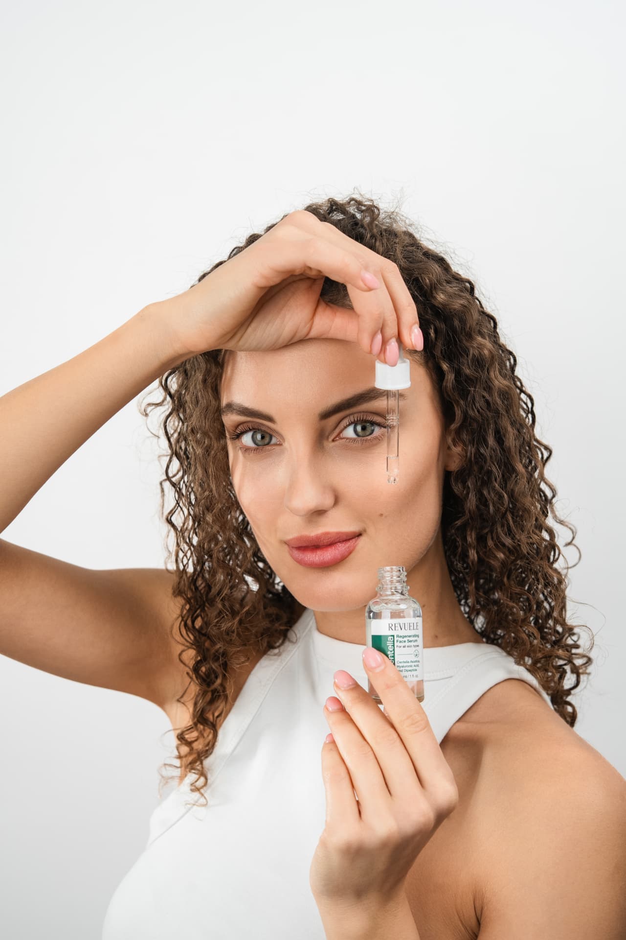 CENTELLA Regenerating Face Serum — packshot in use