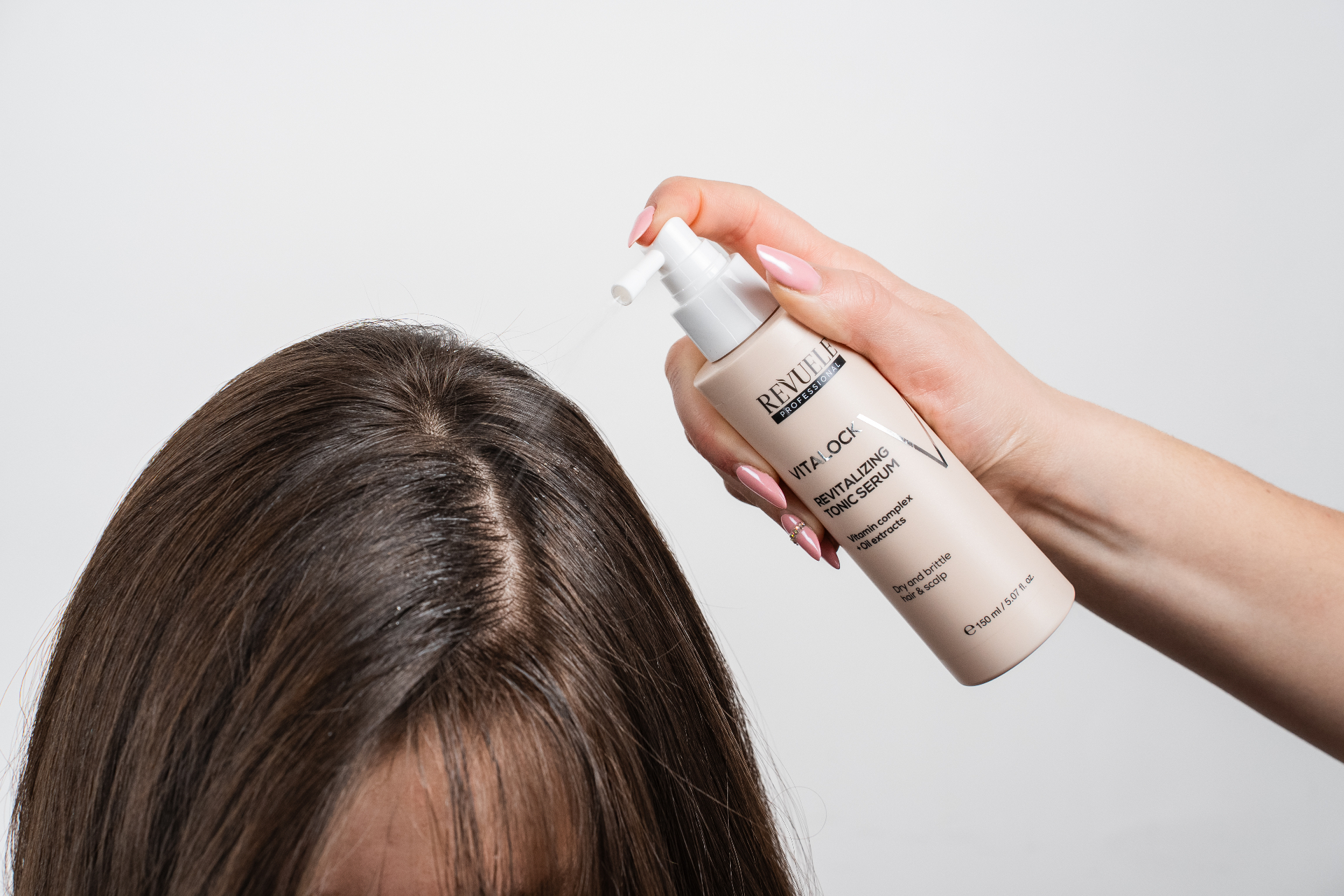 PROFESSIONAL VITALOCK Revitalizing Tonic Serum — packshot in use