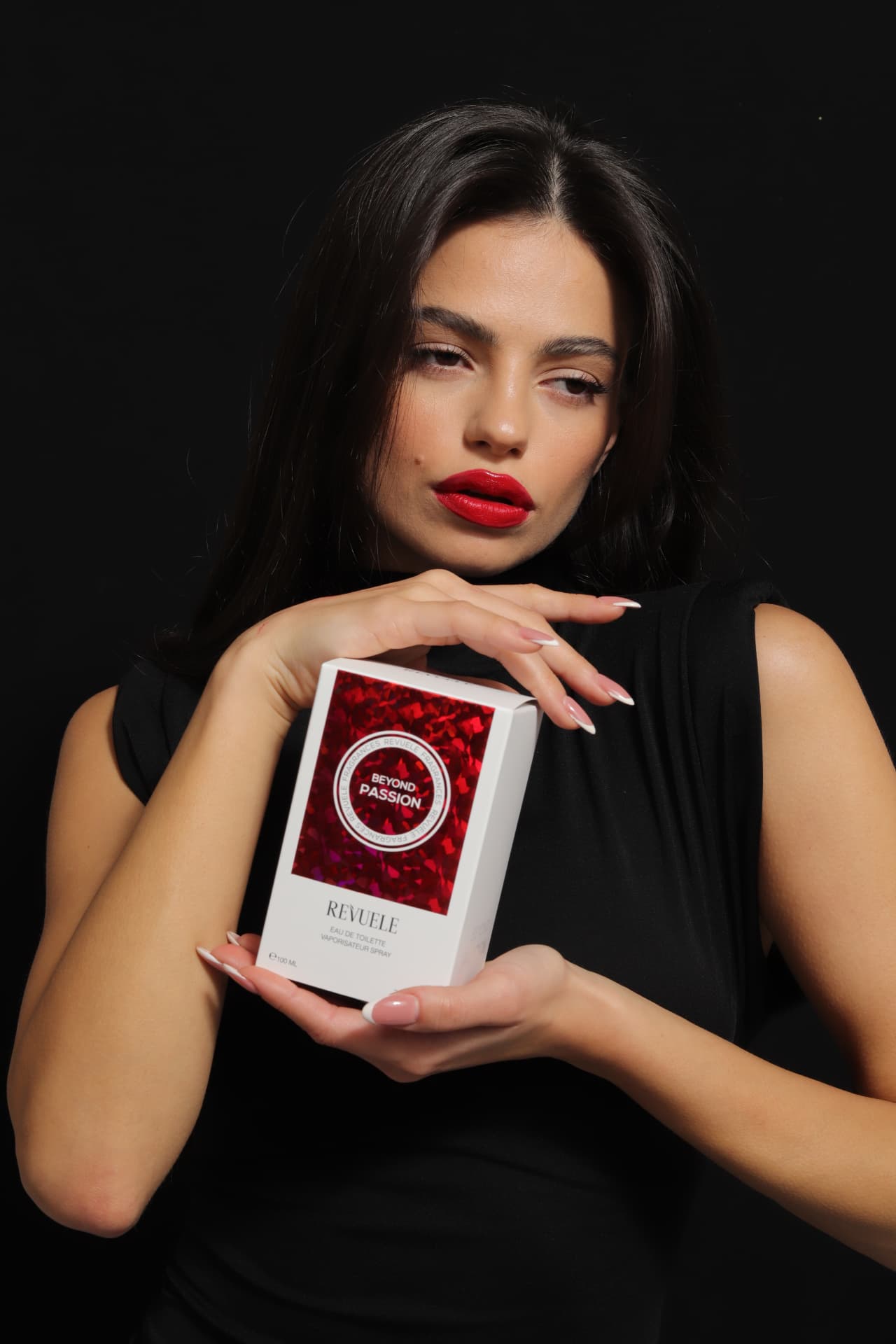 EAU DE TOILETTE WOMEN REVUELE Beyond Passion Eau de Toilette — packshot in use