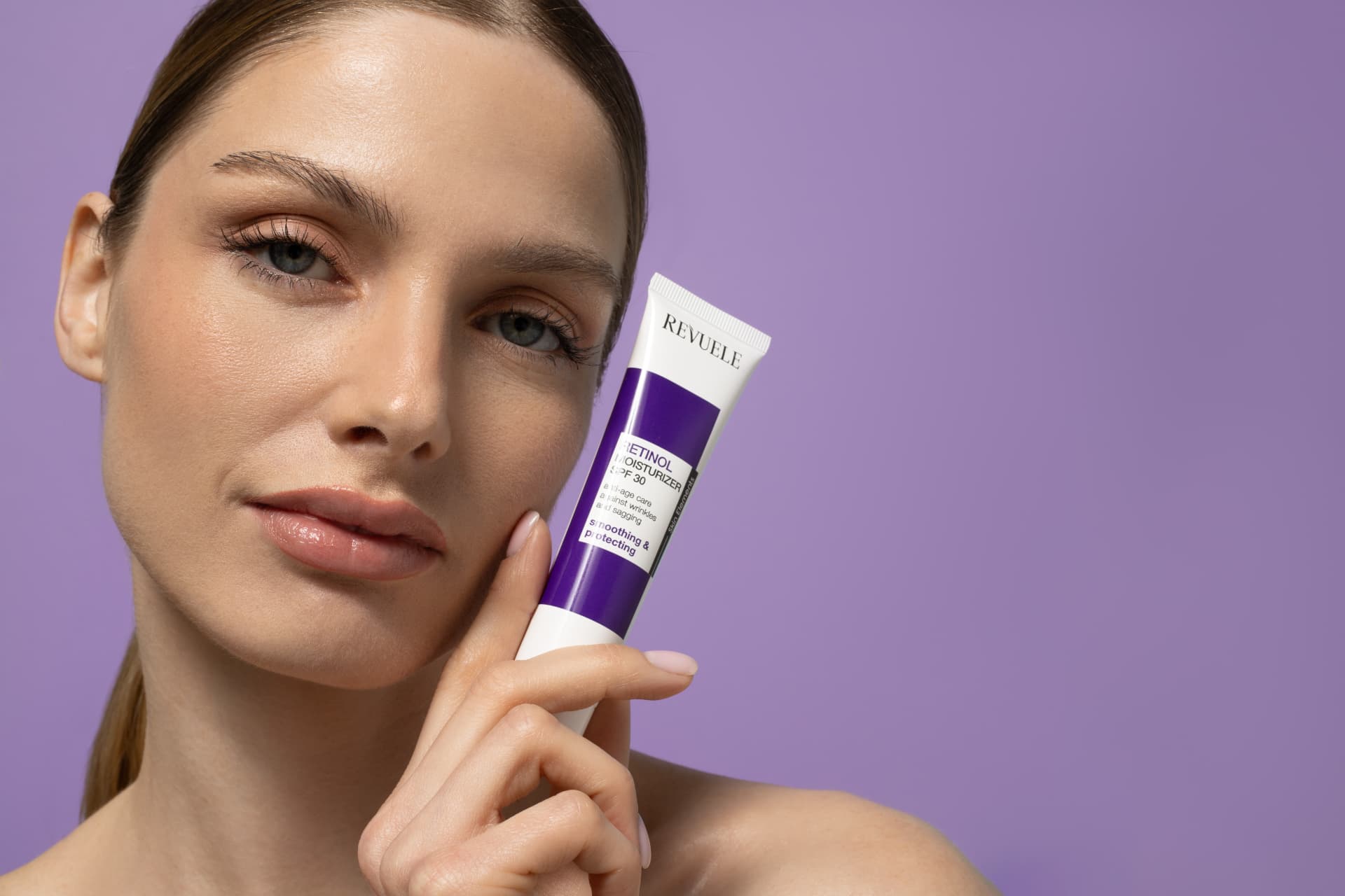 RETINOL Moisturizer SPF30 — packshot in use