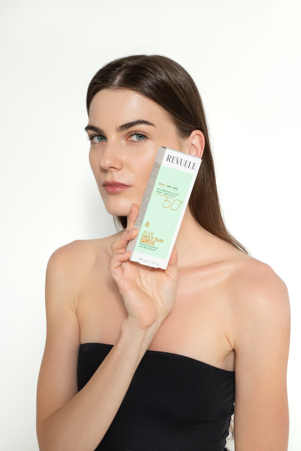 DAILY SUN Aloe Daily Sun Fluid SPF 50+ — packshot in use