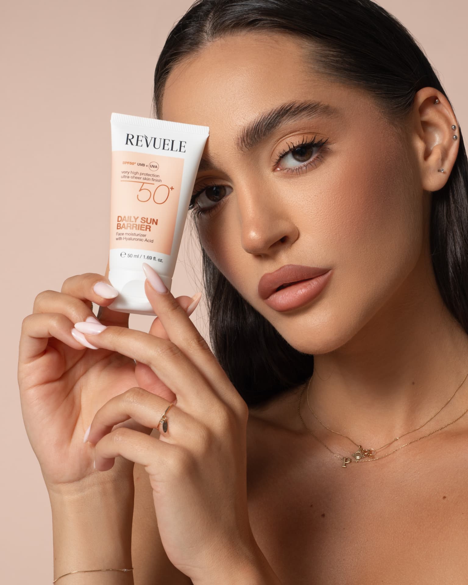 DAILY SUN Daily Sun Barrier SPF 50+ — packshot in use