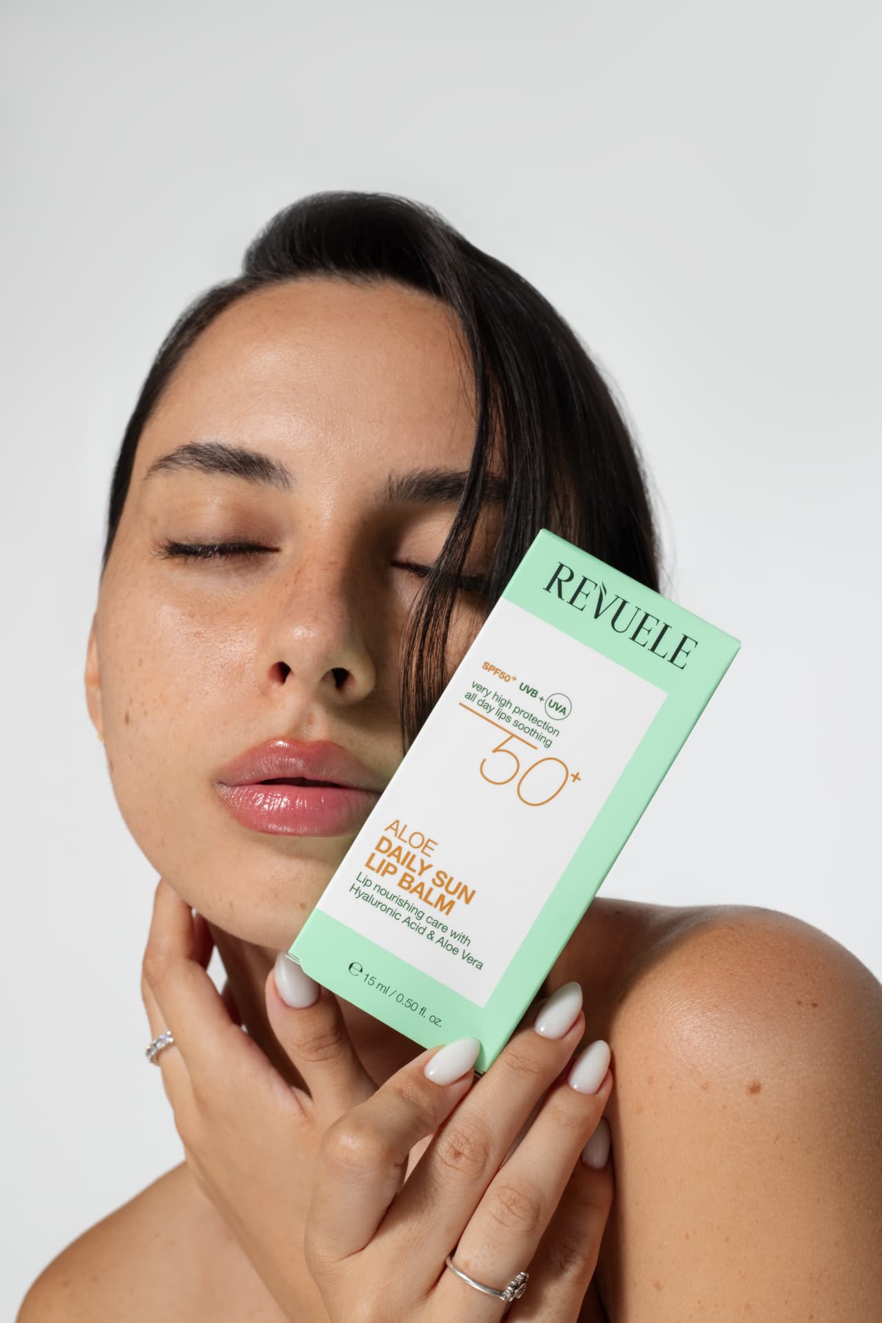 DAILY SUN Aloe Daily Sun Lip Balm 50+ — packshot in use