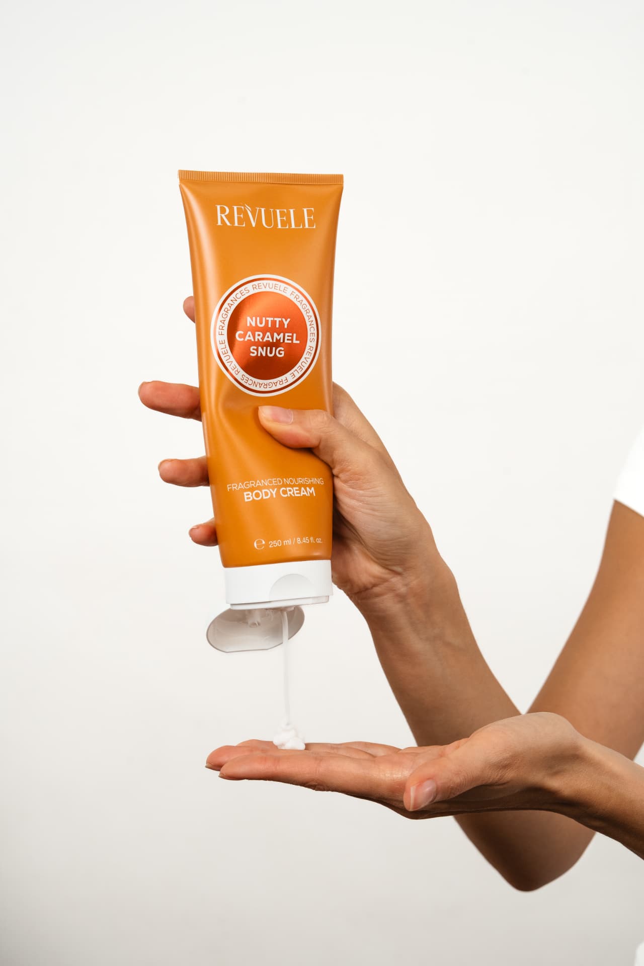 NUTTY CARAMEL SNUG Fragranced Nourishing Body Cream Nutty Caramel Snug — packshot in use