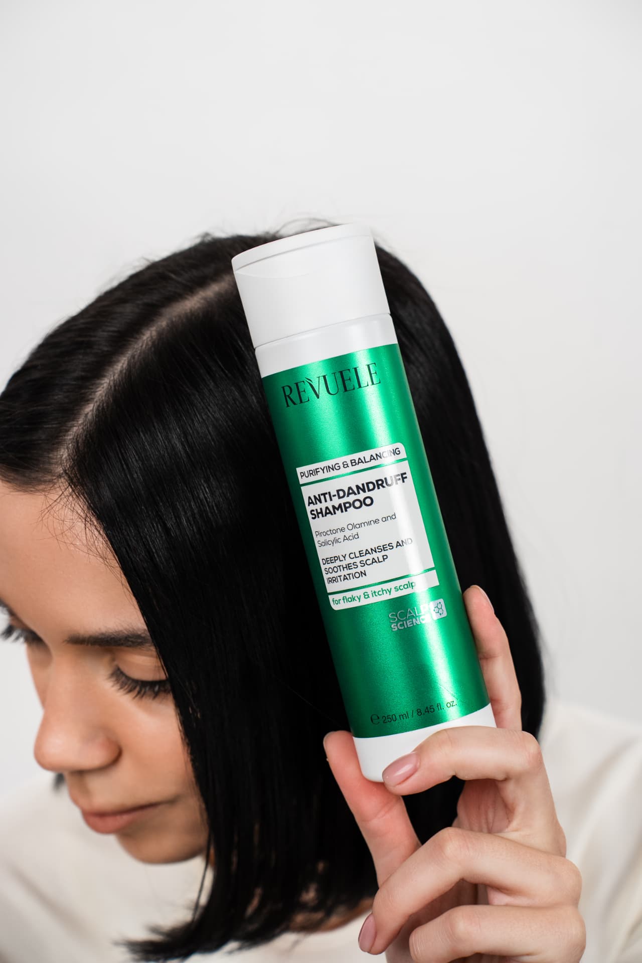 ANTI-DANDRUFF HAIR LINE Shampoo — packshot in use